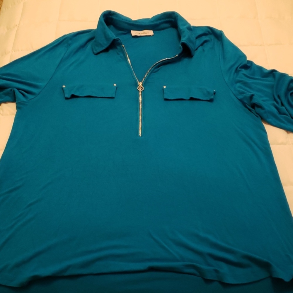Turquoise pull over shirt